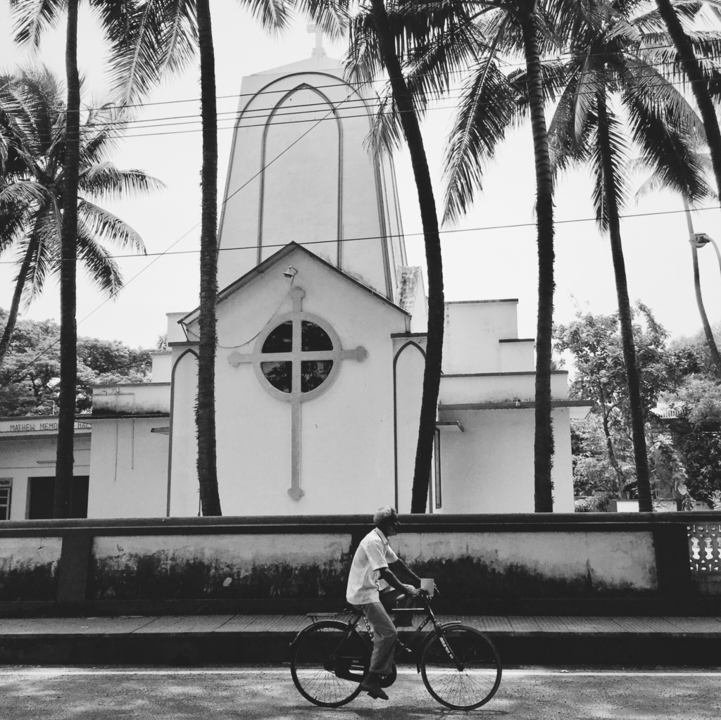 Syrian Christian church, cyclist, Kochi, Kerala, South India, India, Faces Places and Plates blog