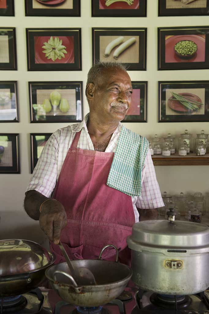 Master Chef Karrupiah of The Bangala Hotel and cooking school in Karaikudi at work on a mutton recipe.