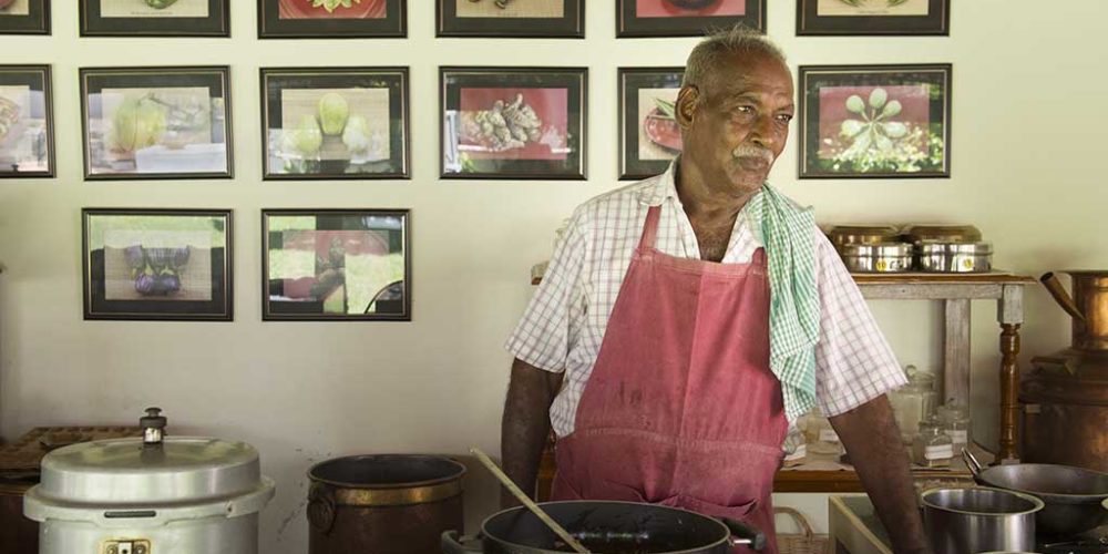 Master Chef Karrupiah of The Bangala Hotel and cooking school in Karaikudi at work on a mutton recipe.