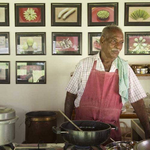 Master Chef Karrupiah of The Bangala Hotel and cooking school in Karaikudi at work on a mutton recipe.