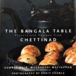 The darkly toned cover of The Bangala Table cookbook.