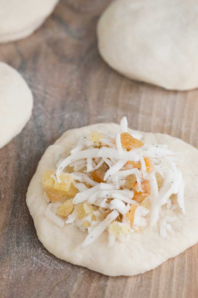 Shredded coconut, candied ginger and citrus peel filling for buns.