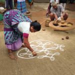 The beginnings of a mandala, a traditional Indian welcome made at the entry to a home