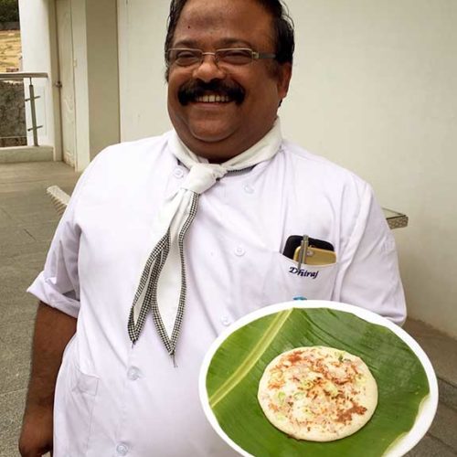 Chef Dhiraj ready to serve utappam.