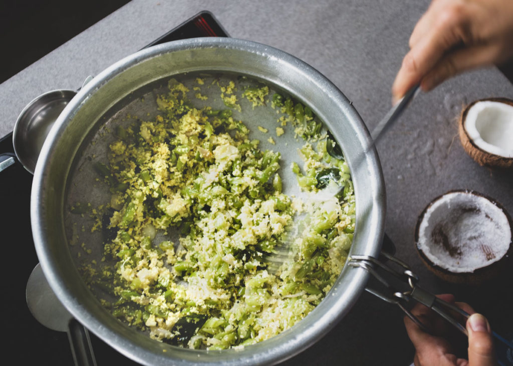 Preparation of green bean thoran.