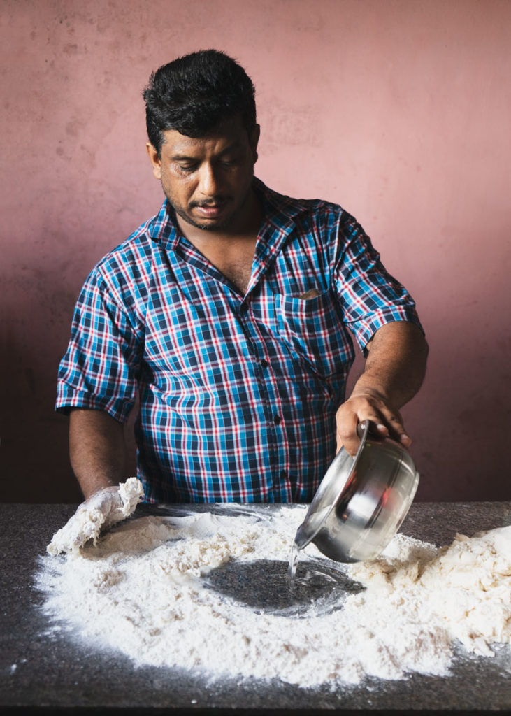 Sheril in the kitchen of his Thekkady cooking school.