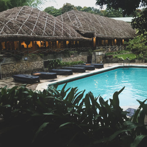 Poolside at CGH Earth's Spice Village.