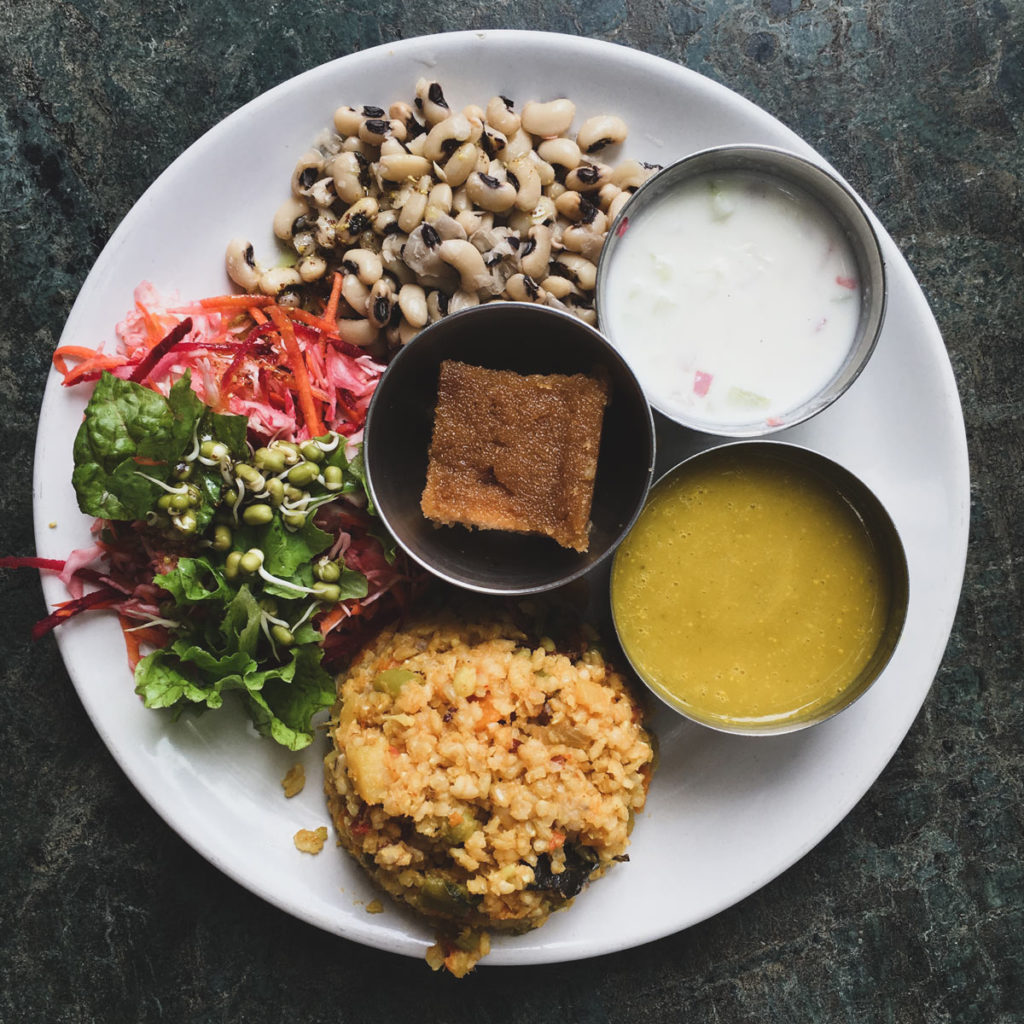 A colourful seven course thali lunch in Auroville - City of Dawn