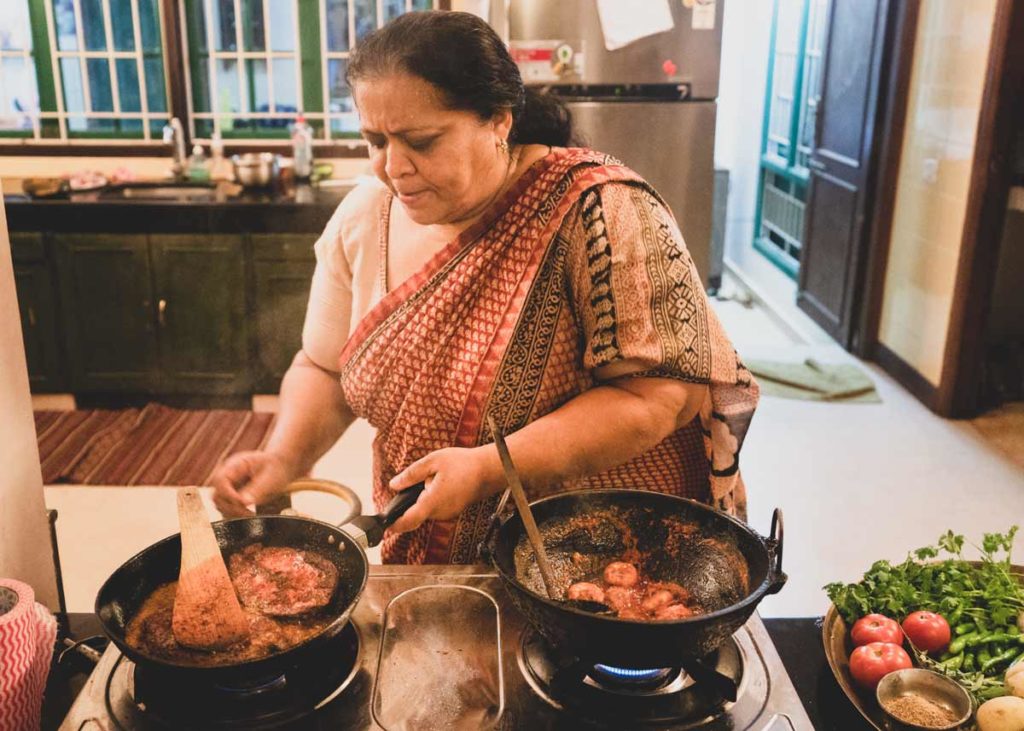 Abida Rasheed prepares fish.