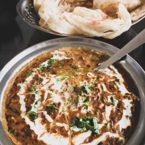 Dal Makhani in a silver bowl.