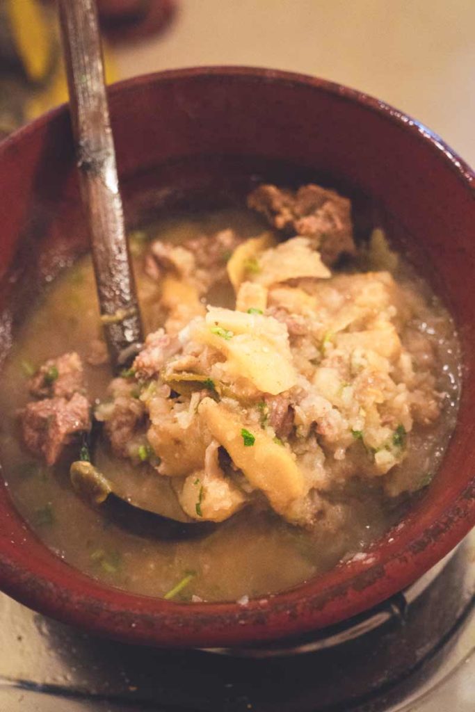 Moplah Mutton Ishtew served with wooden spoon