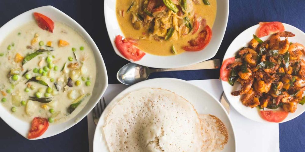 Appams with Fish Molee, Coconut Prawns, and Vegetable Ishtoo