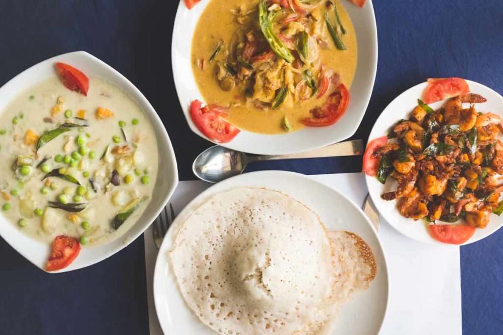 Appams with Fish Molee, Coconut Prawns, and Vegetable Ishtoo