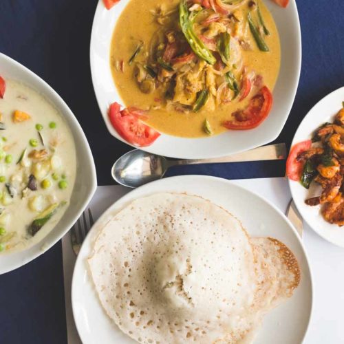 Appams with Fish Molee, Coconut Prawns, and Vegetable Ishtoo