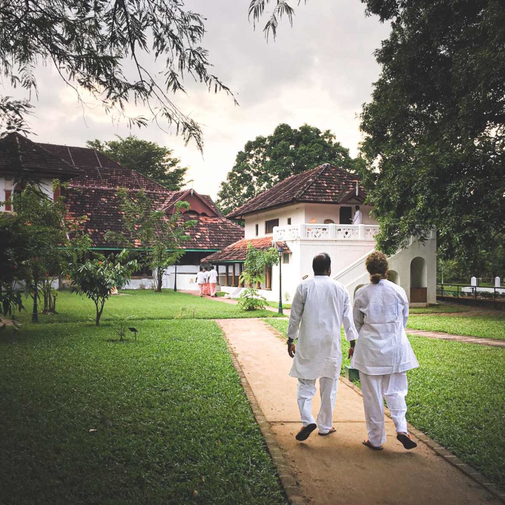 Two people walk on a path