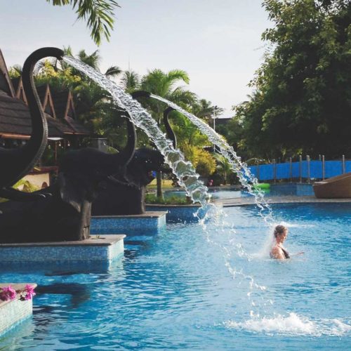 Zuri Kumarakom swimming pool with elephant fountains