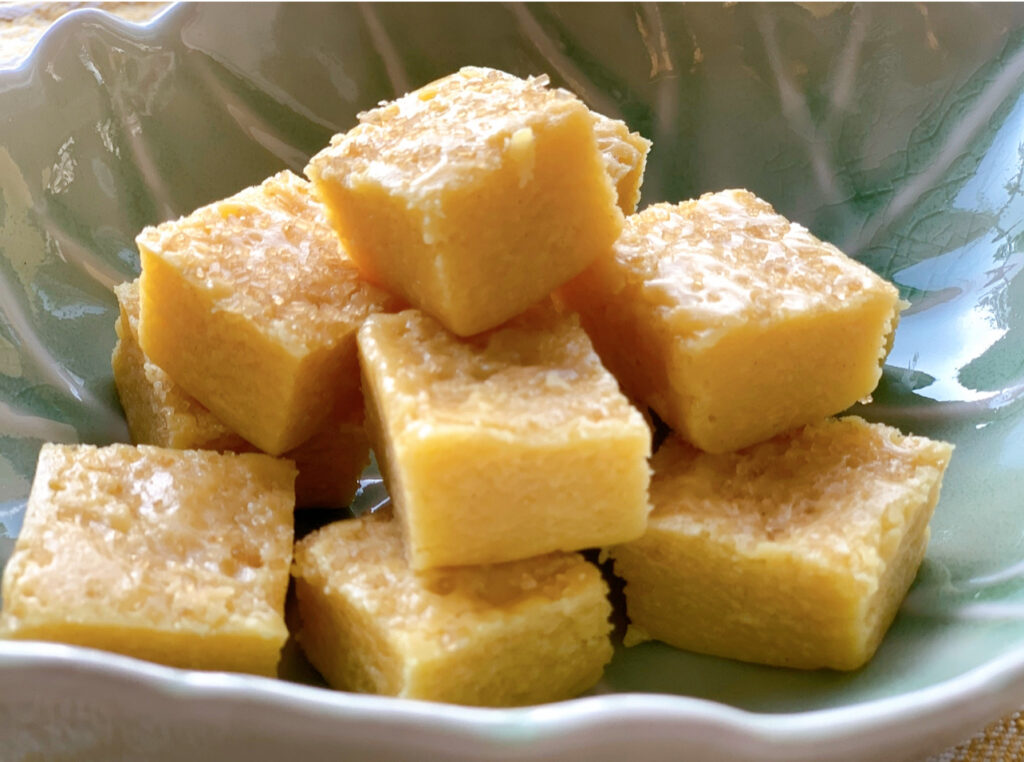 yellow brown fudge on a green plate